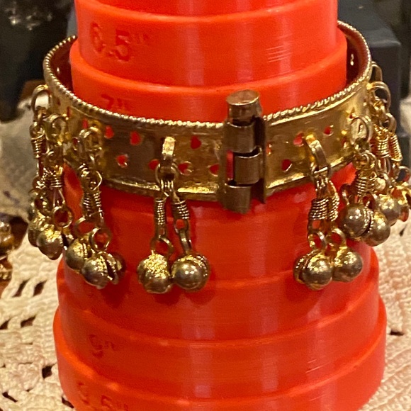 Elegant Gold Tone Bracelet with Dangling Charms - Picture 6 of 11